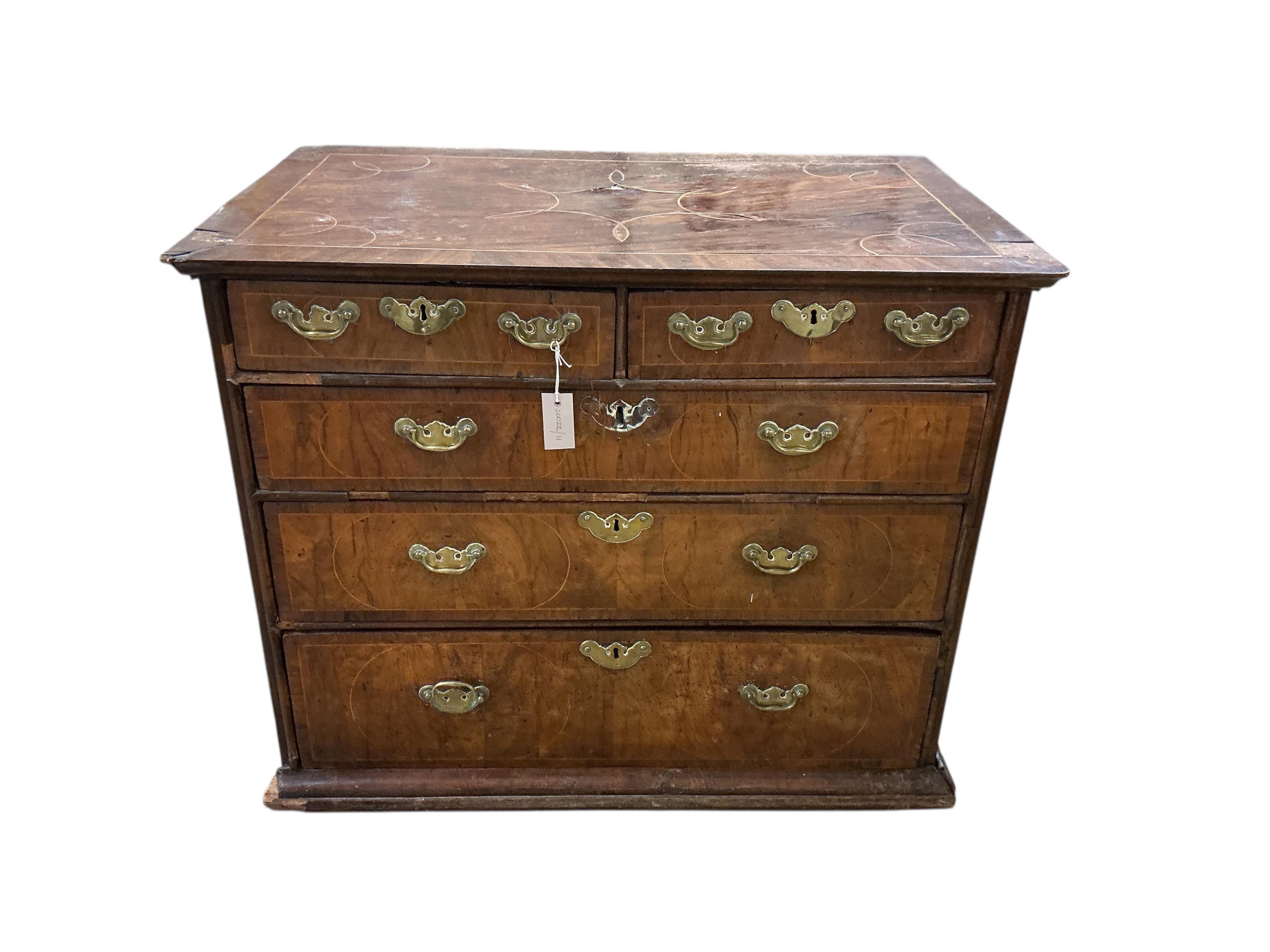 An early 18th century inlaid walnut chest, width 95cm, depth 59cm, height 77cm